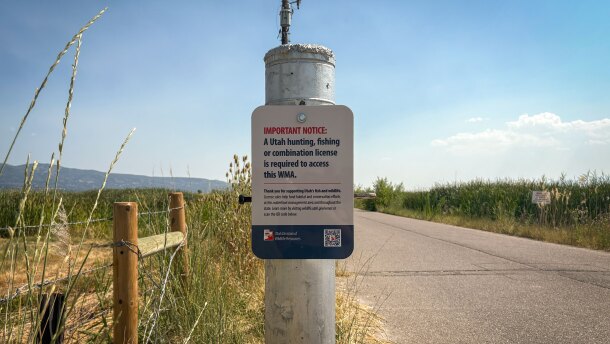 In 2025, the Utah Department of Natural Resources posted signs at Wildlife Management Areas, like this one at Farmington Bay, seen on July 24, 2025, to let people know they need a license to recreate.