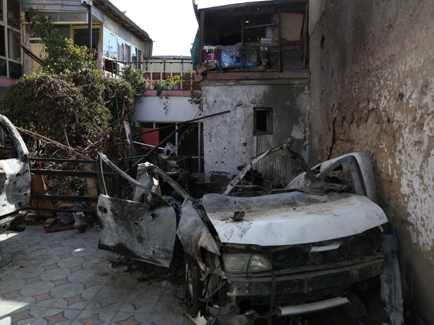 The aftermath of a U.S. drone strike on a car allegedly driven by Zemari Ahmadi.