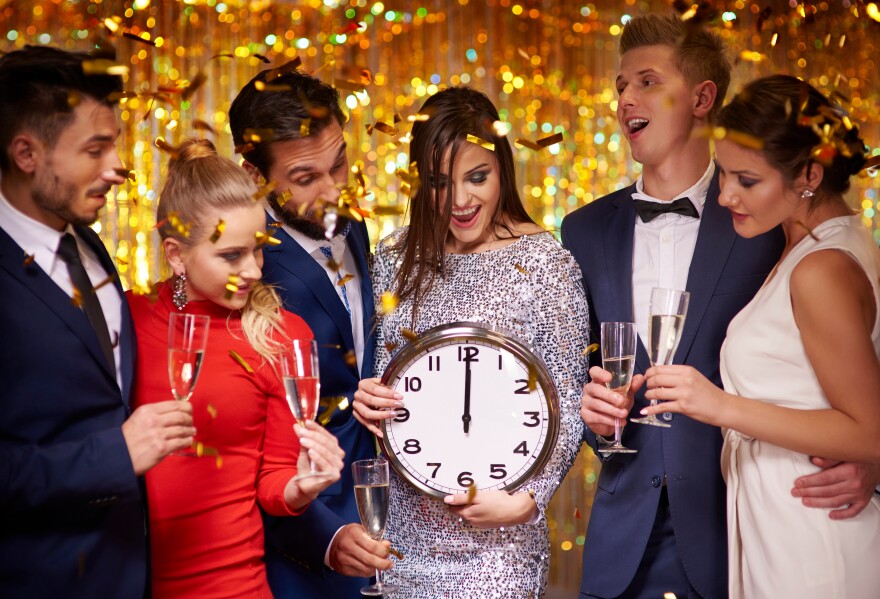 Waiting with friends for midnight on New Year's Eve.