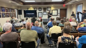 Developer Drew Nations addresses the crowd at a community information session in Stokes County