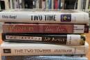 five books in a stack.