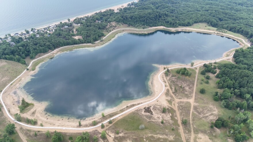 Aerial image of inland lake at Ottawa Sands, including new "Lake Loop" paved path.