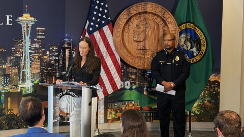 Seattle Mayor Katie Wilson speaks at a podium.
