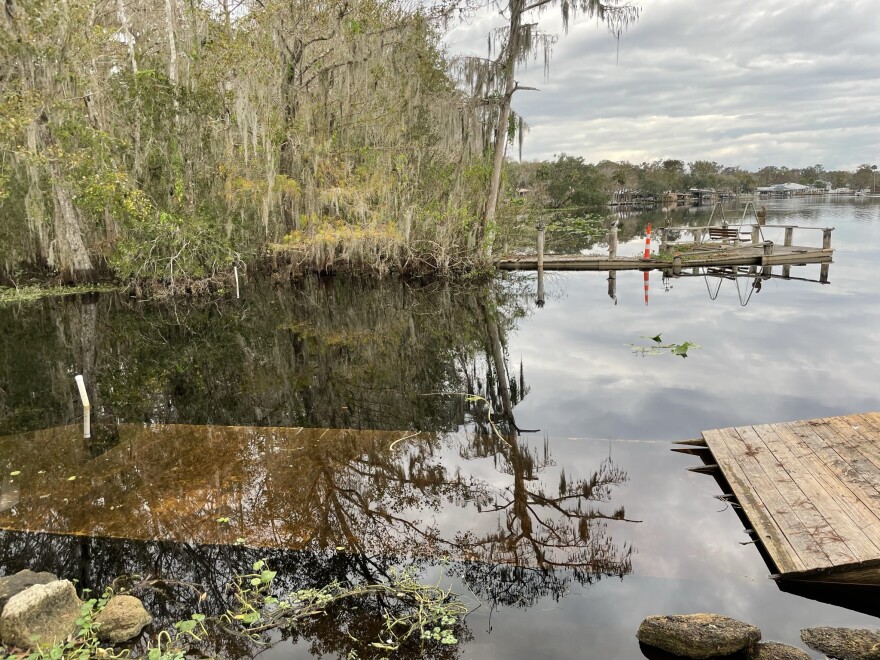 Tom and Mary Ann Simerville's dock remains underwater after Hurricanes Ian and Nicole brough record rain and flooding to the region