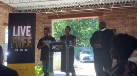 OKC Council member Nikki Nice, Ward 7, speaks at the launch of LiveFreeOKC. Jabee Williams (left) and Pastor Michael McBride (right) are leaders with LiveFree.