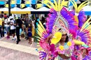 Junkanoo preformer dances in front of the street parade