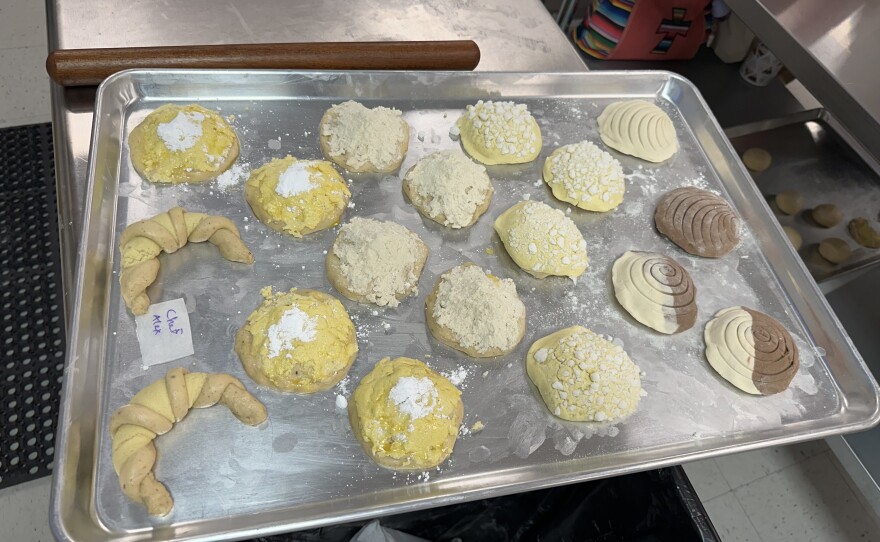 Bakers learn to make different variets of pan dulce during a workshop in San Antonio. Pastries include cuernos bizcochos, nubes, volcánes, chilindrinas, and conchas.