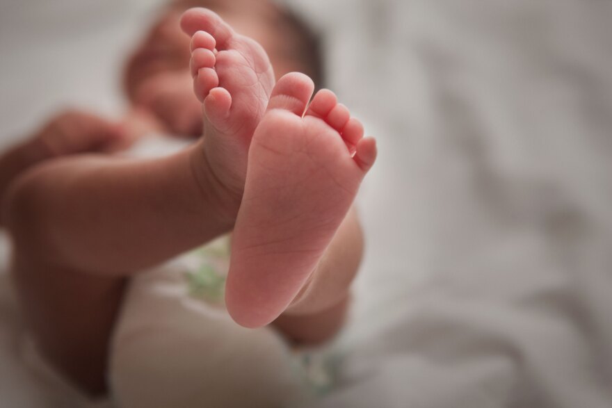 Close up of newborn baby's feet