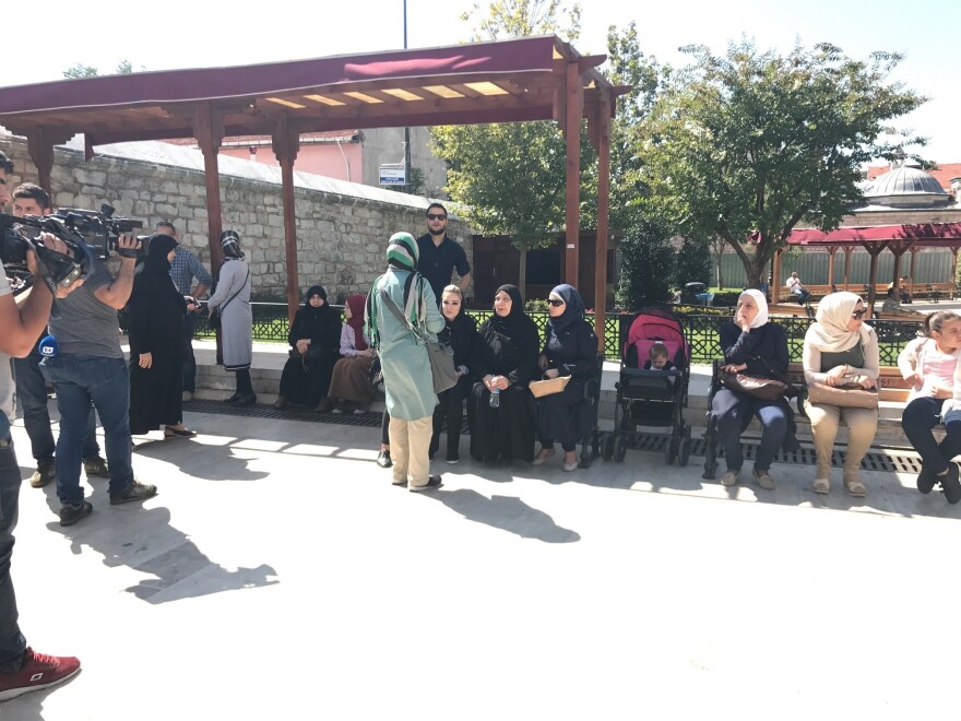 Shaza Barakat (seated center) said of her sister Orouba: "Orouba was always ... defending people's rights and demanding justice."