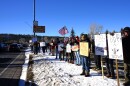 Protesters on Flagstaff's city hall lawn rallied Saturday, January 10, 2026, against Immigration and Customs enforcement and the fatal shooting of a woman in Minnesota last week.