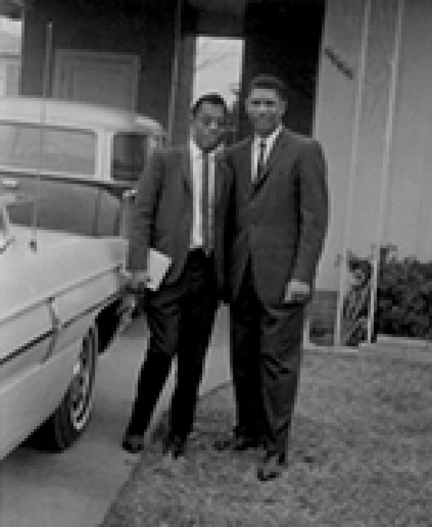 Baldwin with friend and civil rights leader Medgar Evers.