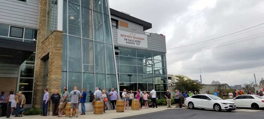 The line to buy New Riff's bonded whiskey Wednesday morning reached from the front doors to the street.