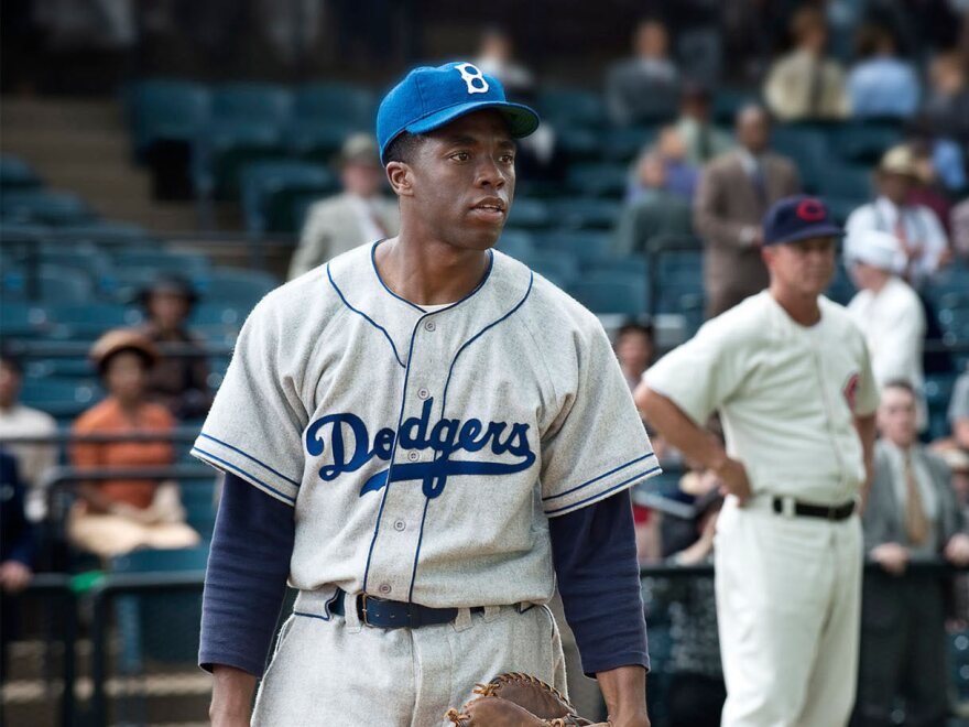 <em>42</em>, the biopic about Jackie Robinson, won the box office last weekend, earning $27 million.