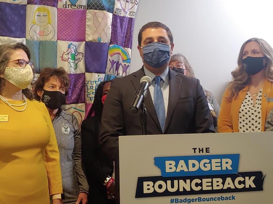 Wisconsin Atty. Gen. Josh Kaul speaks at Monday's news conference at FRIENDS, Inc., in West Bend. Kate Nickel of FRIENDS is at far right.