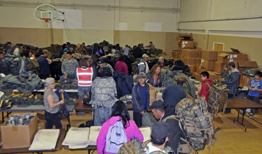 Veterans and family members pick out their gear from a wide selection. (Photo courtesy Samuel Hudson)