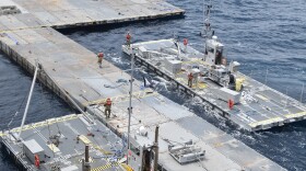 U.S. Army Soldiers assigned to the 7th Transportation Brigade and Sailors build pier off the shore of Gaza. April 26, 2024.