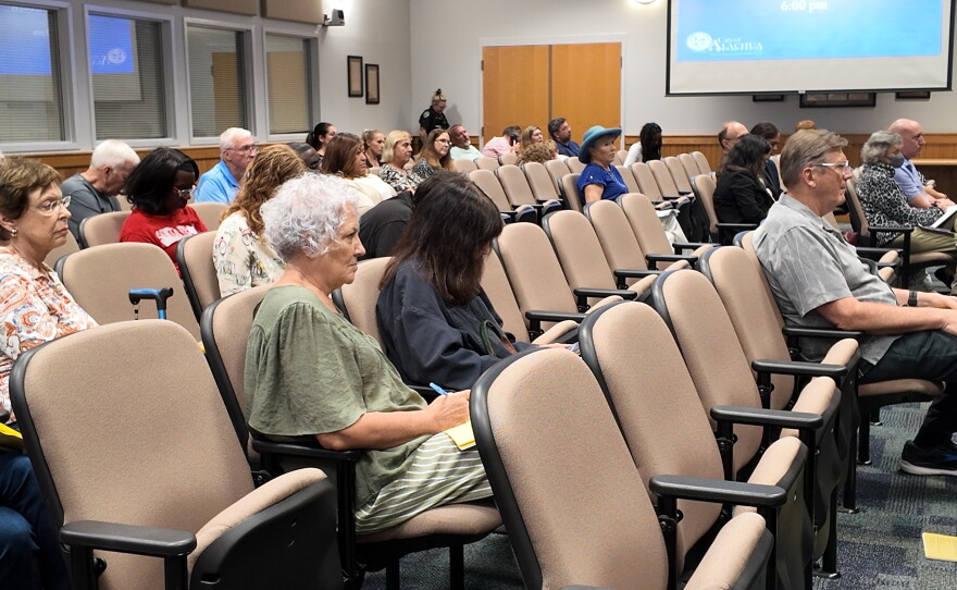 Alachua residents showed up to the City Commission meeting on Monday to express their concerns about the role data centers could have in the new financial budget for the City of Alachua, and how resources would be distributed throughout the city. (Dulce Rodriguez-Escamilla/WUFT News)