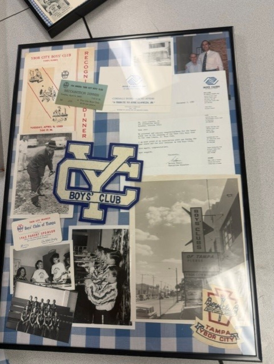 Framed memorabilia of old pictures and signage 