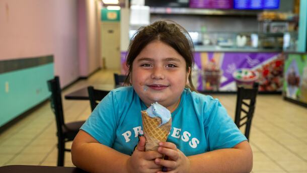 Yazmine Guerrero, 7, of St. Joseph, Missouri, enjoyed a bubblegum ice cream waffle cone recently at Frutopia, located at 3737 Independence Avenue in Kansas City, Missouri. Frutopia is a Mexican paleteria, ice cream shop, and grill.