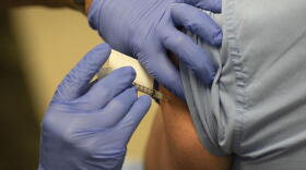 COVID-19 vaccines by Pfizer-BioNTech are administered at the IU Health Neuroscience Building Wednesday, Dec. 16.