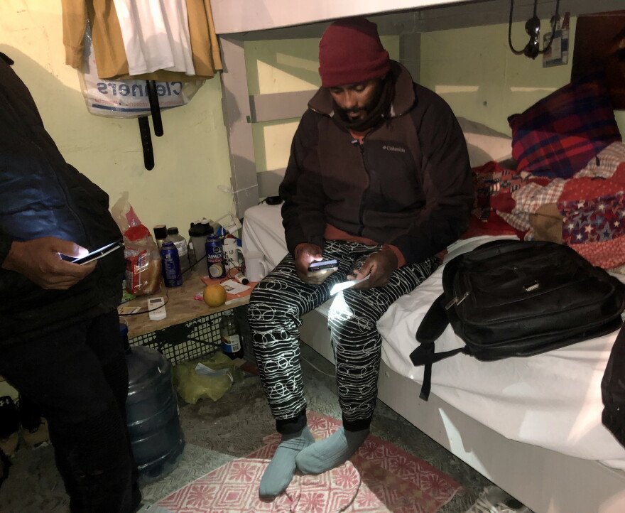 Mikel, an asylum seeker from Cuba, tries to register to enter the U.S. through a UNHCR web portal.