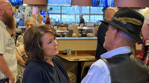 Former state Sen. Sine Kerr, who is running for Arizona lieutenant governor, speaks with an unidentifed voter in Yuma on Monday, Sept. 7, 2026.