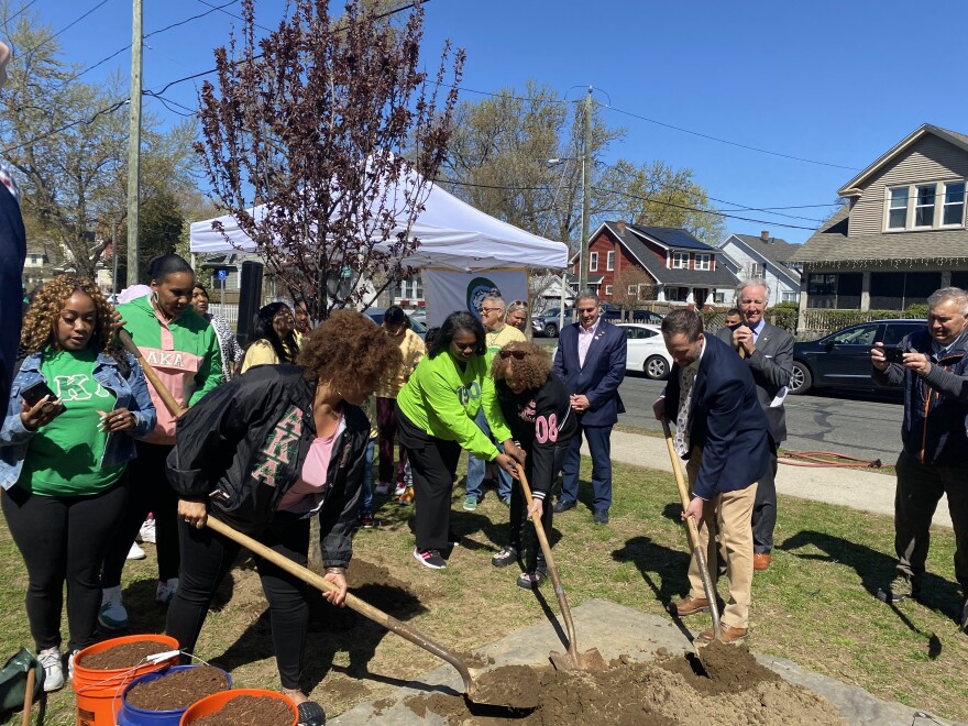 Springfield elementary students, residents and officials plant a tree at Washington Street School in honor of Arbor Day.