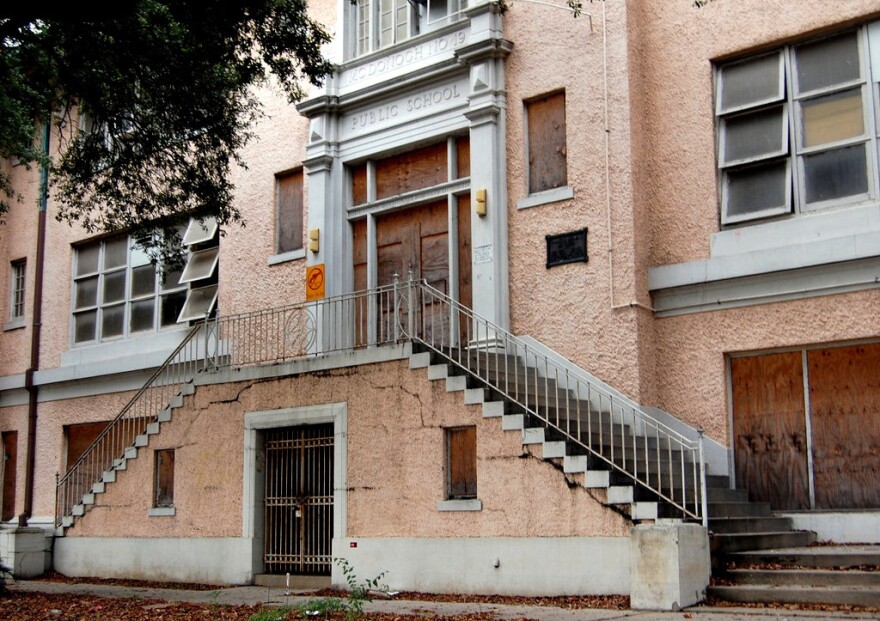 The McDonogh #19 Public School in New Orleans' Lower Ninth Ward was closed in 2004 and damaged from Hurricane Katrina. It is vacant today.