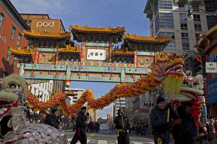 Dancers perform the lion and dragon dances, during Chinese New Year celebrations in Washington D.C.'s Chinatown, Sunday, Feb. 10, 2019.