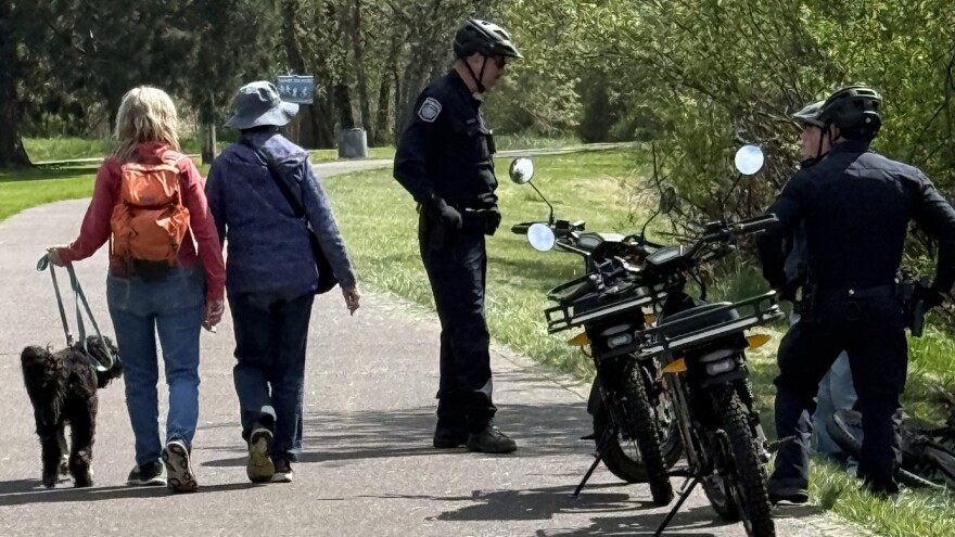 Eugene Police stop an e-bike rider on April 8, 2026.