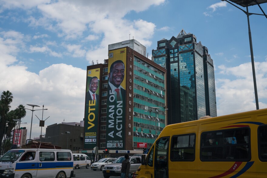 Emmerson Mnangagwa's campaign poster hangs on the side of a building in downtown Harare.