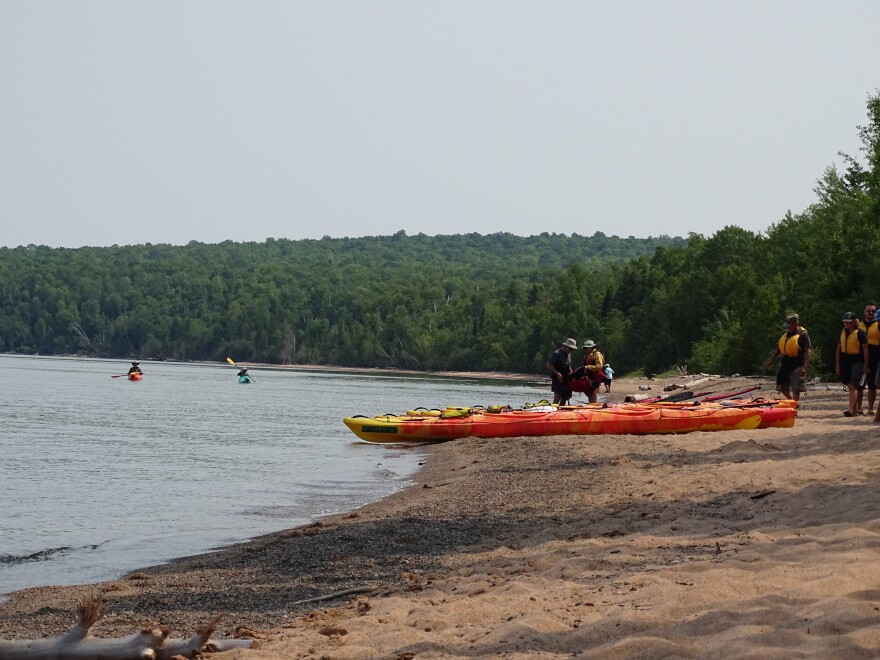 Kayakers prepare to head out into the water at Meyers Beach.