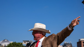 Texas Agriculture Commissioner Sid Miller speaks at a rally against data center development on the Capitol grounds in Austin on July 27, 2026.