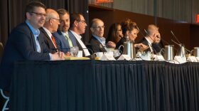 a group of people sit at a table