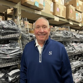 Joe DeRosa owns Smitty Officials Apparel in Canton. He uses his experiences as an NBA referee to create sports officials uniform.