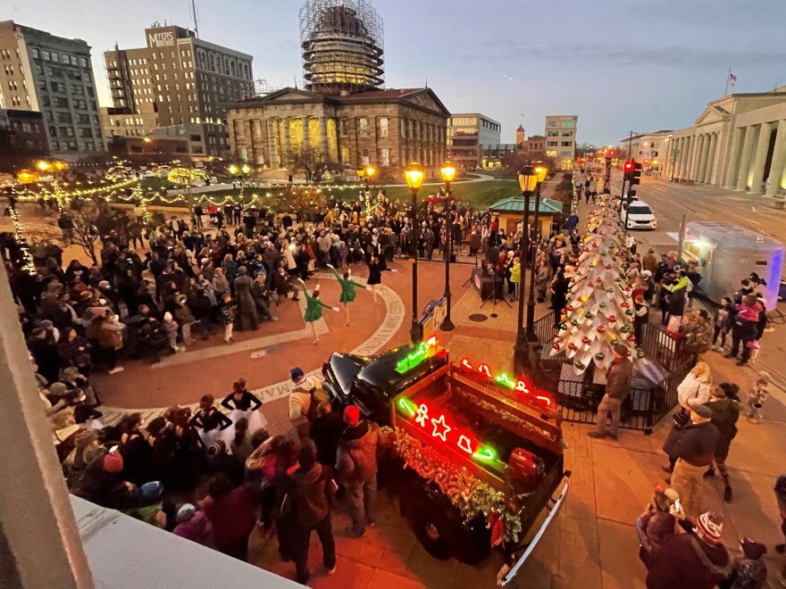 A crowd gathers for a holiday performance in downtown Springfield.