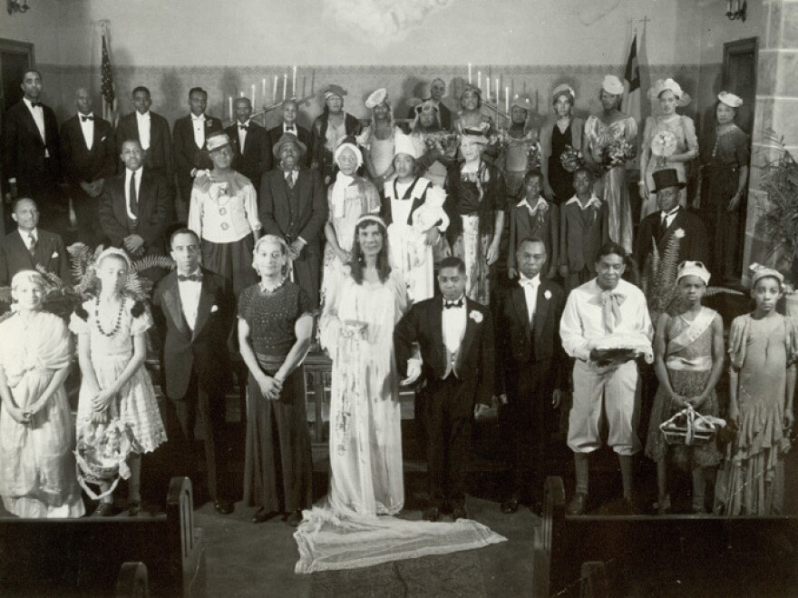 Womanless weddings, like this one in a Methodist Church in Cincinnati, Ohio, often included prominent members of the community. Alongside the bride, with hands clasped, is Theodore M. Berry, the first African-American mayor of the city.