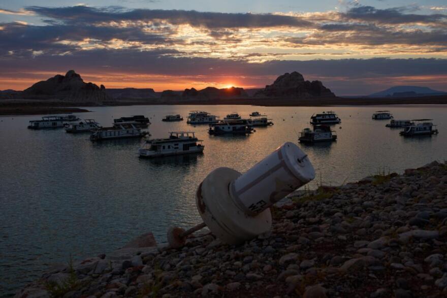 A formerly floating buoy now sits high and dry above Lake Powell at the Glen Canyon National Recreation Area, July 15, 2026, near Page, Nev. (John Locher/AP)