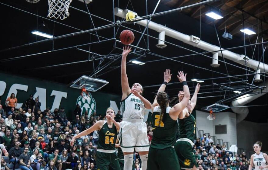 Action shot of Tanya Meyer vs Missouri Southern basketball