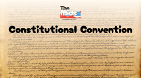 In front of a page from the U.S. Constitution is a light orange gradient background. On the gradient is The Mids logo and the words "Constitutional Convention."