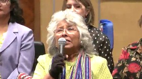 Arizona Sen. Sally Ann Gonzales, wearing the glove her mother wore while picking cotton, lashes out Thursday, March 26, 2026 at Republicans for allowing only a vote to repeal the Cesar Chavez holiday without considering proposals to rename it to honor farmworkers.