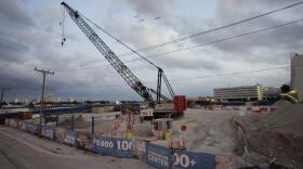 The site where an 800-room luxury hotel will be built alongside the Broward County Convention Center, is seen Tuesday, March 22, 2022, in Fort Lauderdale. An Associated Press review finds state and local governments have spent nearly $1 billion worth of federal coronavirus aid on projects that have little to do with combating the pandemic. In Broward County, $140 million will help to build an upscale hotel.