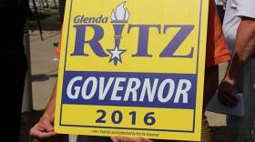A supporter holds his sign supporting state superintendent Glenda Ritz during her announcement she will run for governor in 2016.