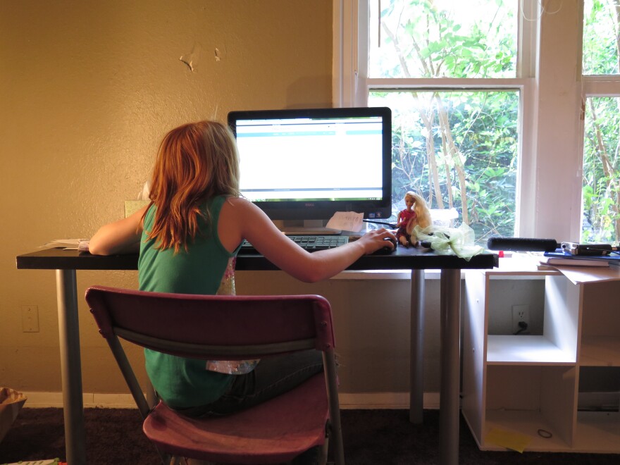 An Epic Virtual Charter School student in Oklahoma City uses her computer as her classroom. 