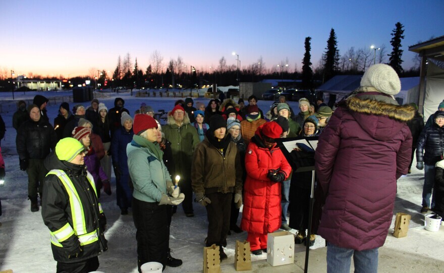 Karen Martin Tichenor addresses attendees at a candelight vigil for Sonia Espinoza Arriaga and her kids on Sunday, Mar. 1, 2026 in Soldotna, Alaska.