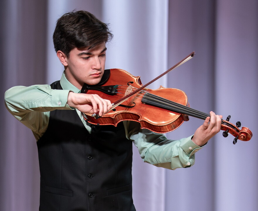 Violist Anton Wingert performing in the PMAY Showcase concert.