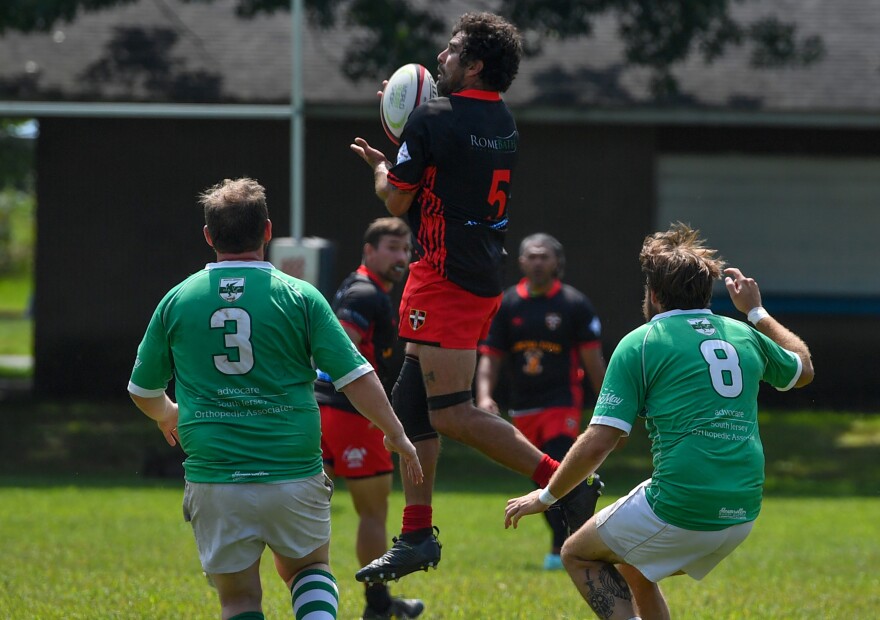 TC Mazar catches the stone.
