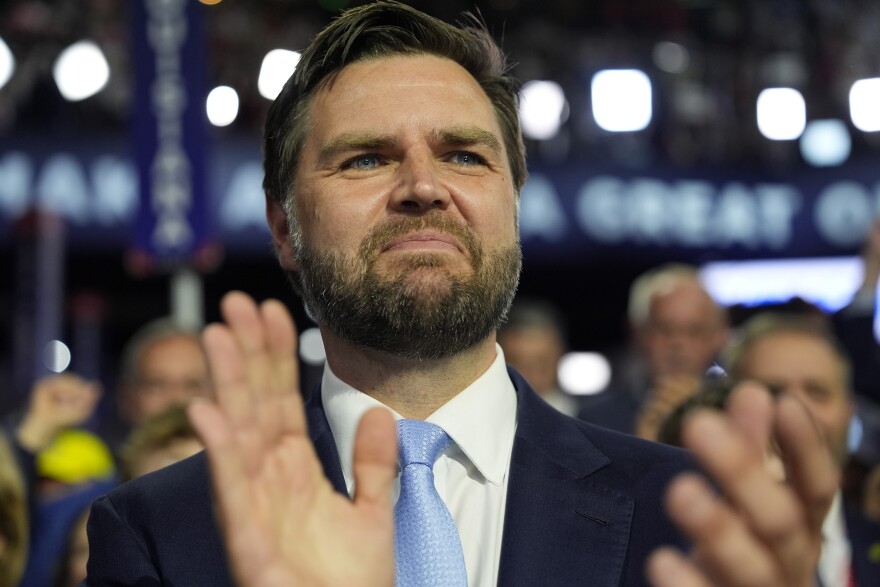 Republican vice presidential candidate Sen. JD Vance, R-Ohio, arrives on the floor during the first day of the 2024 Republican National Convention at the Fiserv Forum, Monday, July 15, 2024, in Milwaukee. (AP Photo/Carolyn Kaster)