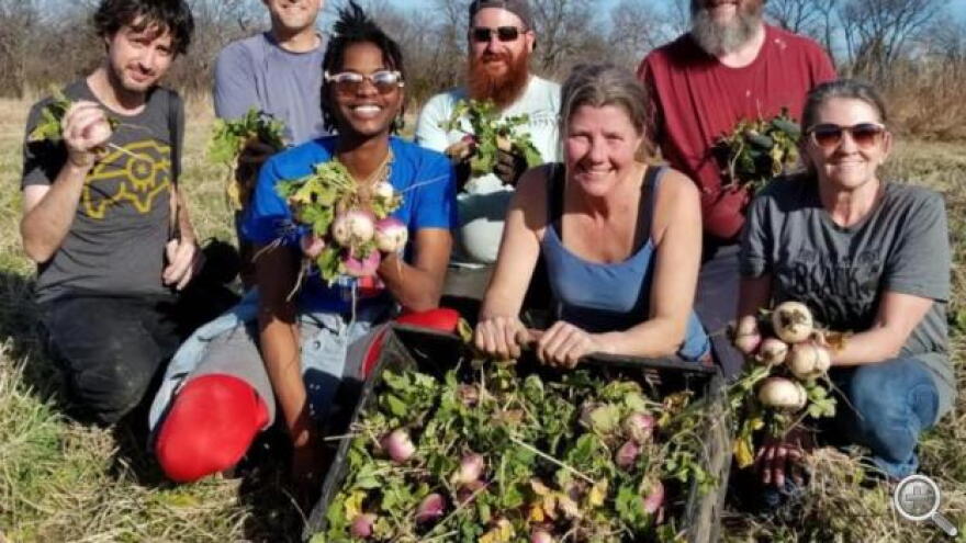 Katie Plohocky, executive director of the Healthy Community Store initiative, with gleaning volunteers. 