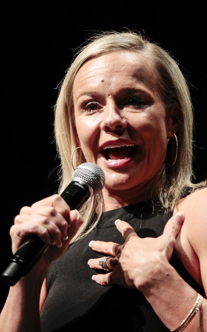 Olympian Amanda Borden speaks to the audience at the Arizona Storytellers night of stories from Olympians and the journalists who cover them on July 19, 2016
